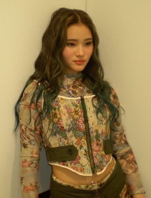 Michelle wearing a costume with flower patterns on it