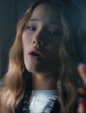 A screenshot of Michelle in the new narrative music video